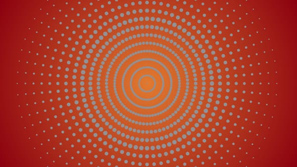 Starburst of dotted rings over a vignette with an orange center and brick red edges.